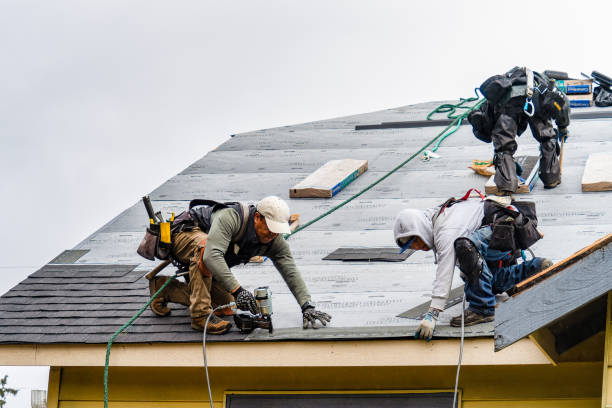 Professional Gutter Installation technician working in Valley Stream, NY